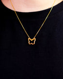 Colar Dourado com Pingente de Borboleta Vazado em Contorno Delicado
